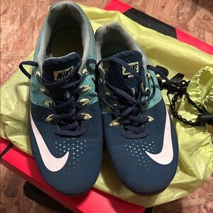 Nike Teal Track shoes with White Swoosh